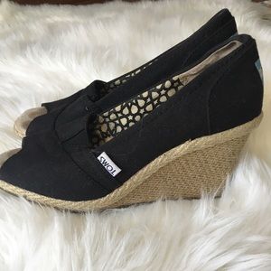 Women’s Toms peep toe wedge.